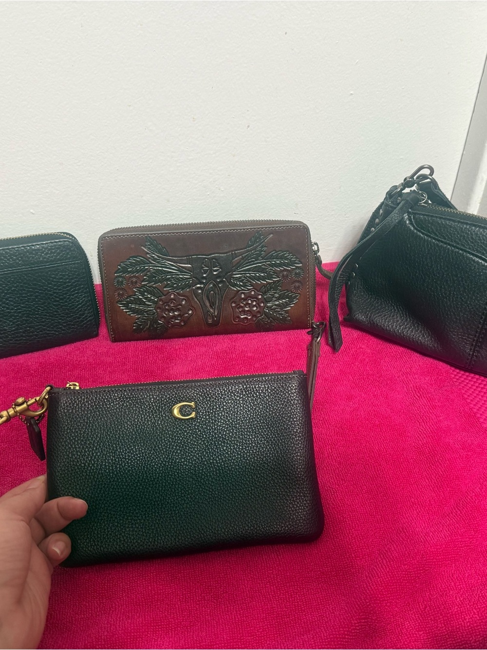 Coach Black Pebbled Leather and Wristlet with Gold 'C' Accent 
4 bundle wallets